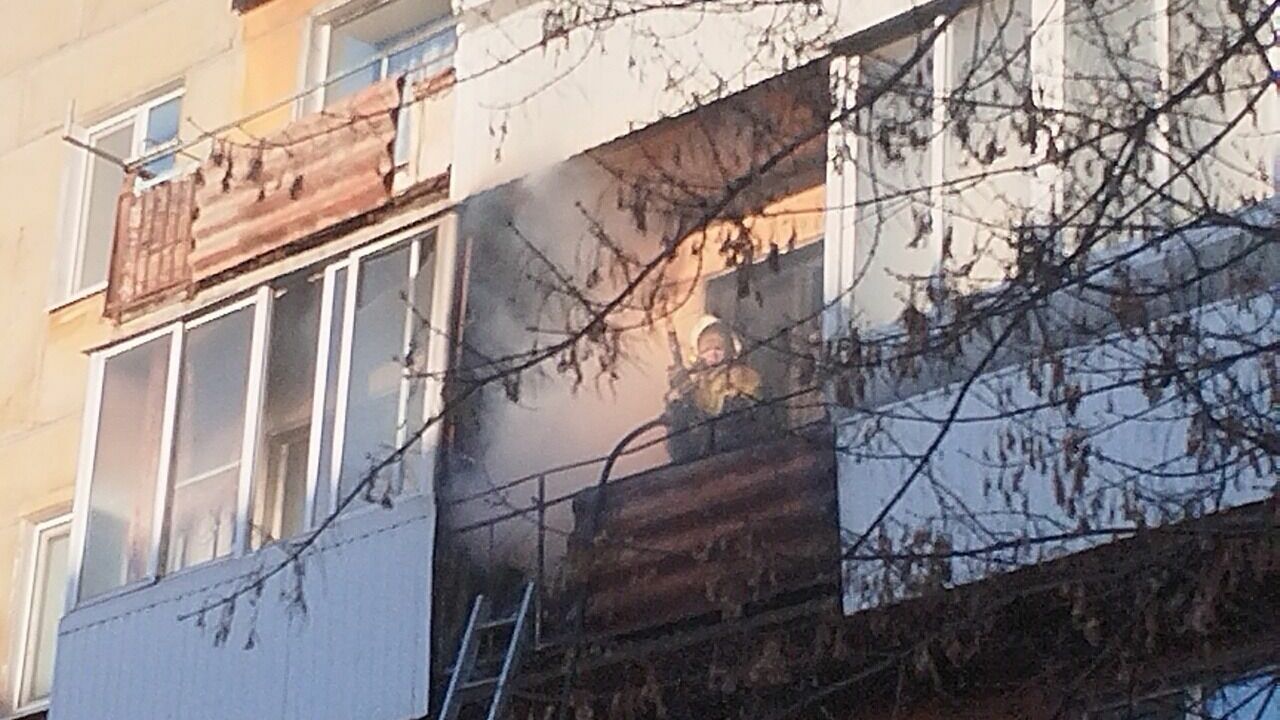 Квартира загорелась на улице Попова 